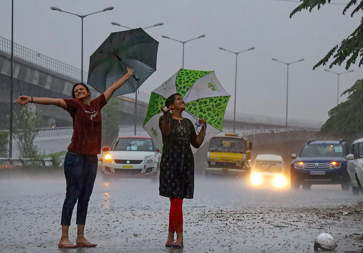 dinamani2Fimport2F20212F72F212Foriginal2Frains weather rain women
