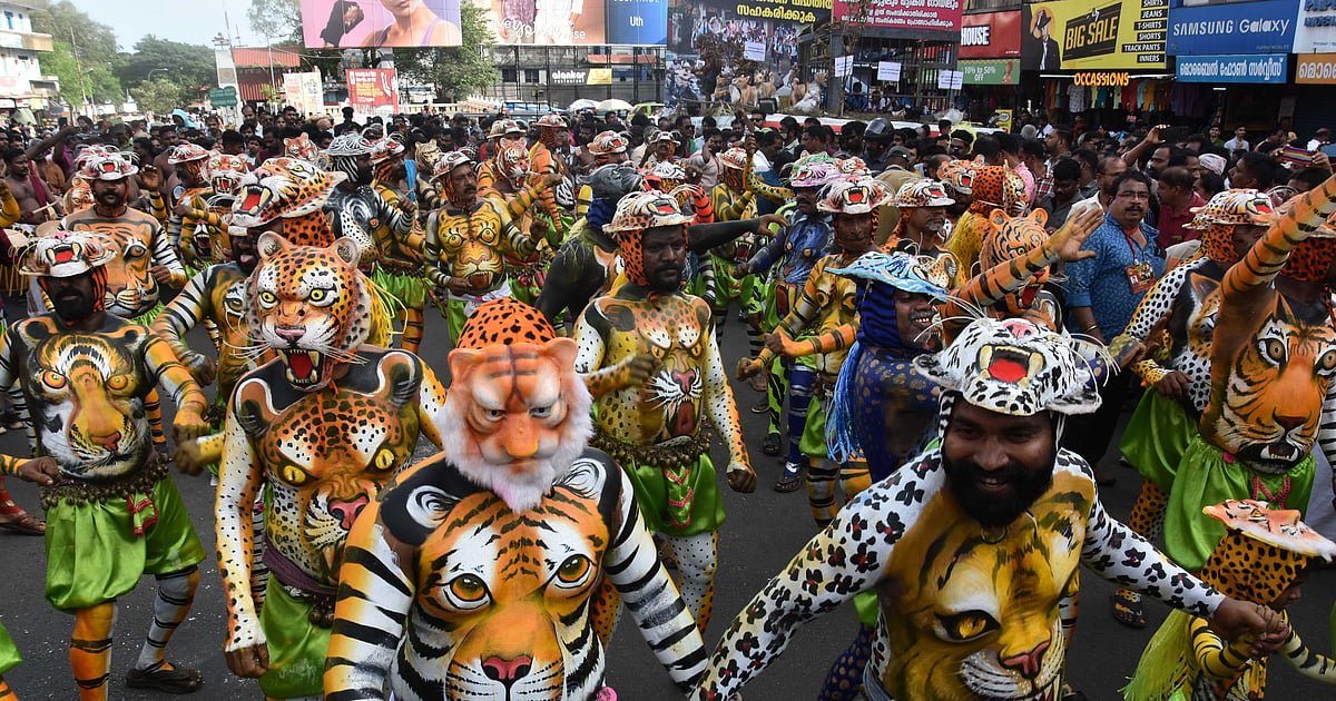 செண்டை முழங்க… புலிகள் உரும… கேரளத்தை அதிரவைக்கும் புலிகளி ஊர்வலம்! | Photo Album